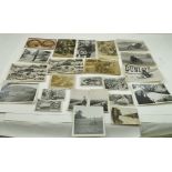 A COLLECTION OF ISE OF MAN T.T. RACES POSTCARDS AND BLACK & WHITE PHOTOGRAPHS includes a card of