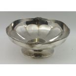 WILLIAM GREENWOOD & SONS A GEORGE VI SILVER BONBON DISH, having a wavy shaped rim, raised on