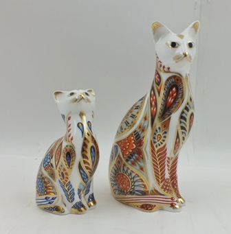 TWO ROYAL CROWN DERBY PAPERWEIGHTS, "Siamese Cat" with gold stopper, 13cm high, boxed, and "