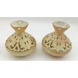 A PAIR OF LOCKE & CO. OF WORCESTER PORCELAIN VASES, of squat reticulated form, blush ivory ground,