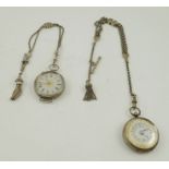 TWO LADY'S SILVER CASED FOB WATCHES, having decoratively chased cases, decorative dials, on fancy