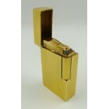 AN 18CT GOLD CASED DUPONT OF PARIS CIGARETTE LIGHTER, chequered case, ref. no. B1658, 6cm x 3.5cm