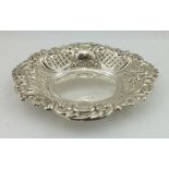 ALBERT SYDENHAM A VICTORIAN DESIGN SILVER BONBON DISH, having basket weave and floral decoration,