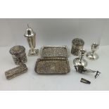 A COLLECTION OF SILVER ITEMS including a pair of Edwardian embossed pin trays, Birmingham 1903, 14cm