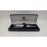 A SILVER CASED BALLPOINT PEN and TWO SILVER PROPELLING PENCILS (3)