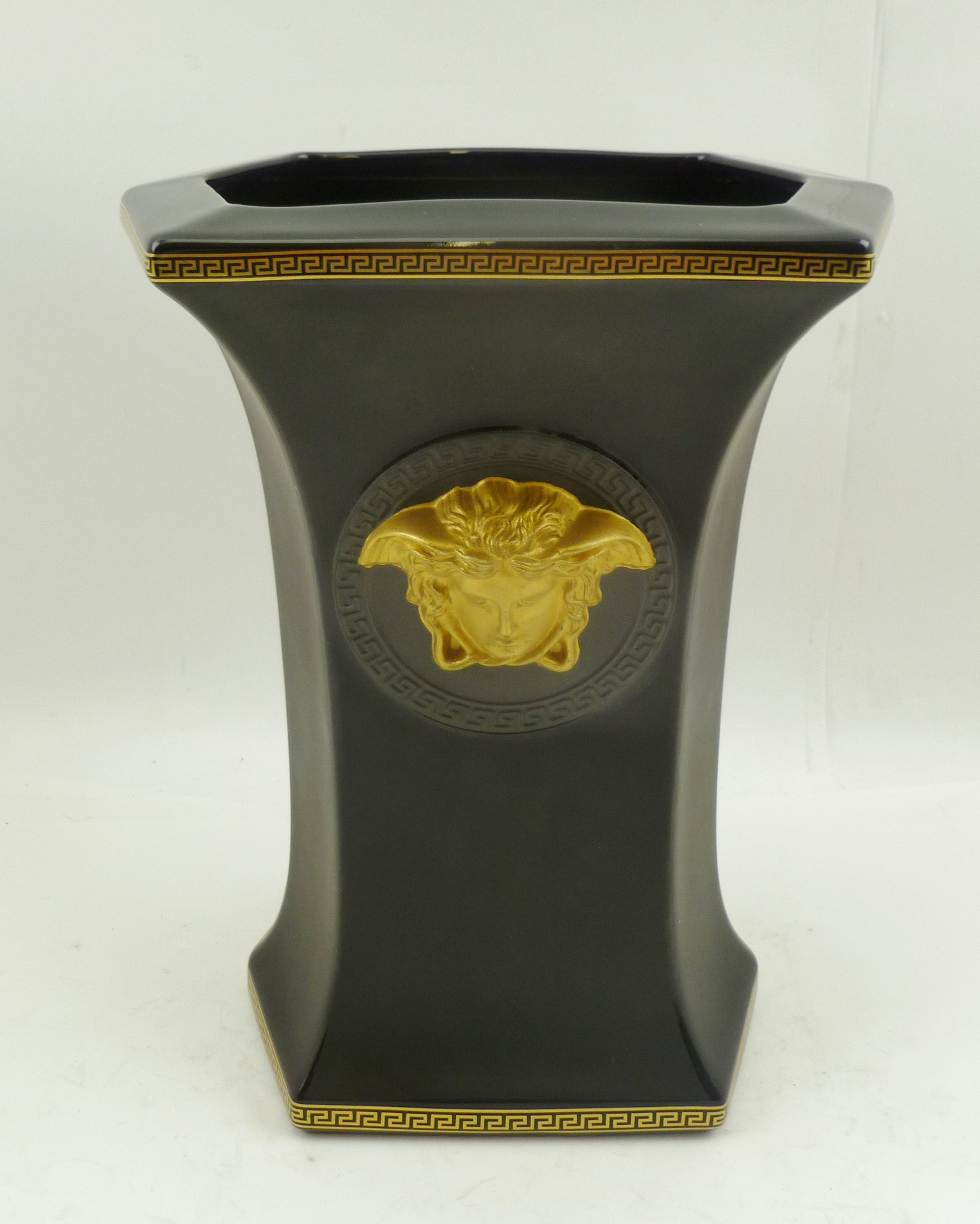 A ROSENTHAL VERSACE CERAMIC VASE, of waisted hexagonal form, black ground, with Greek key borders,