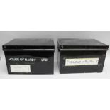 TWO BLACK TIN DEED BOXES BEARING THE NAMES "HOUSE OF HARDY LTD" AND "FARLOWS OF PALL MALL LTD." each