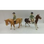 TWO BESWICK POTTERY FIGURINES, a girl wearing a green hacking jacket riding a skewbald pony,