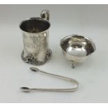 HENRY WILKINSON & CO. A VICTORIAN SILVER CHRISTENING TANKARD, having "C" scroll handle and