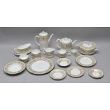 A ROYAL WORCESTER "HYDE PARK" PATTERNED AND GOLD LEAF DECORATED DINNER SET, comprising;- 14 x dinner