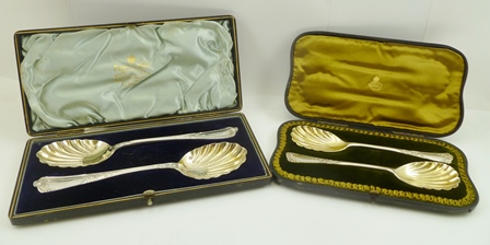 JOSIAH WILLIAMS & CO. A PAIR OF LATE VICTORIAN FRUIT SERVING SPOONS, each with leaf cast handle