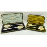 JOSIAH WILLIAMS & CO. A PAIR OF LATE VICTORIAN FRUIT SERVING SPOONS, each with leaf cast handle