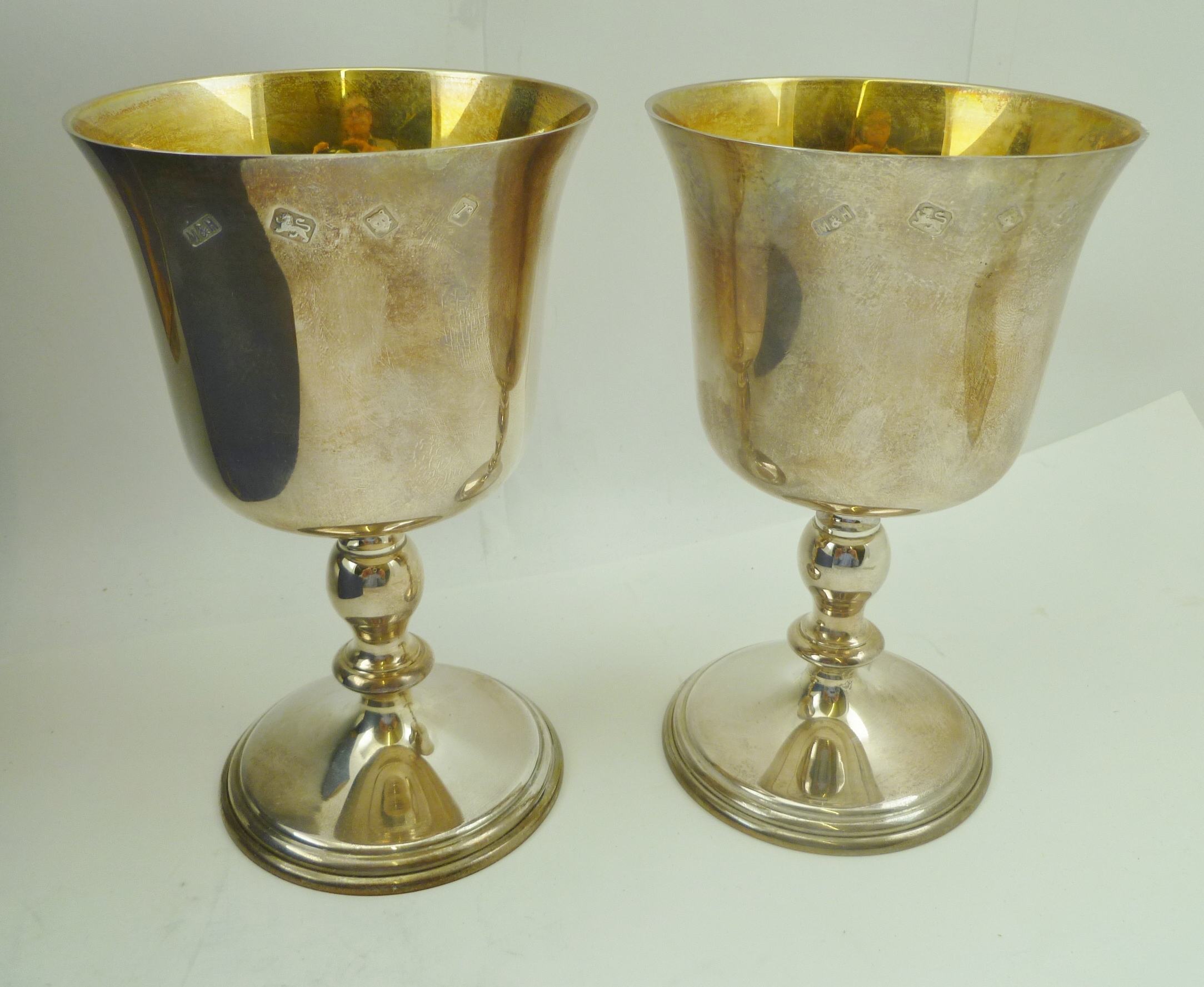 MILLS & HERSEY A PAIR OF SILVER STEMMED WINE GOBLETS, the interiors gilded with flared rim bowls, on - Image 2 of 3