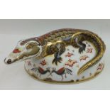 A ROYAL CROWN DERBY PAPERWEIGHT of a Crocodile, gold signature edition, with gold stopper, boxed