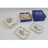 A ROYAL CROWN DERBY BONE CHINA "HONEYSUCKLE" PATTERN TRINKET BOX, in original box, together with