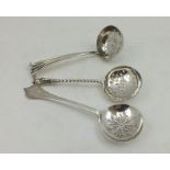 THOMAS BRADBURY & SONS A SILVER SUGAR SIFTING SPOON, Sheffield 1923, together with TWO SILVER