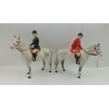 TWO BESWICK POTTERY FIGURINES, one a huntsman on a grey horse, together with a lady in black