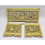 THREE CARVED WOOD CHINESE PANELS, comprising a pair, pierced and gilded with Ho-ho bird