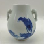 A CHINESE BLUE AND WHITE PORCELAIN VASE, moulded Ruyi handles to shoulders, hand painted cobalt blue