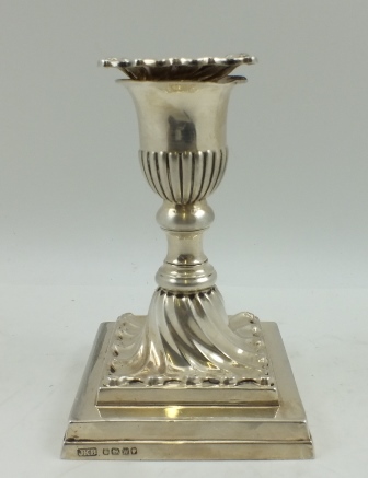 HAWKSWORTH, EYRE & CO. A VICTORIAN SILVER PIANO CANDLESTICK with removable wrythen drip pan,