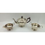 HARFORD CASE CO. A THREE-PIECE SILVER TEA SET, of plain squat form with beaded rim, comprising