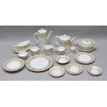 A ROYAL WORCESTER "HYDE PARK" PATTERNED AND GOLD LEAF DECORATED DINNER SET, comprising;- 14 x dinner