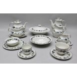 A ROYAL DOULTON "BURGUNDY" PATTERN TC1001 TEA AND DINNER SERVICE, comprising;- 2 x teapots, 2 x