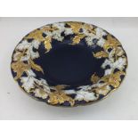 A MEISSEN SHALLOW BOWL, cobalt blue ground with moulded acanthus leaf rim, gilded, blue underglaze