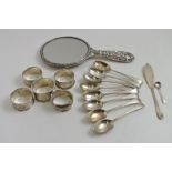 JOSIAH WILLIAMS & CO. A SET OF EIGHT SILVER TEASPOONS with feather cut edges, London 1916,