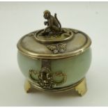 A CHINESE JADE POT WITH WHITE METAL MOUNTS, the cover with seated monkey knop handle and applied