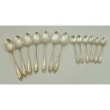 R.F. MOSLEY & CO. A SET OF SEVEN SILVER DESSERT SPOONS, Sheffield 1930, together with a SET OF SIX