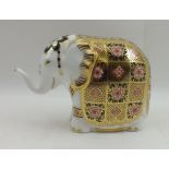 A ROYAL CROWN DERBY PAPERWEIGHT, "The Yorkshire Rose Elephant" no. 429/500, having raised trunk,