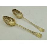 TWO MATCHING SILVER GILT FRUIT SPOONS, Birmingham 1797 and Newcastle 1837, 114g.