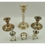 A VICTORIAN SILVER SALT, London 1886, two silver PEPPER POTS, a PAIR OF SMALL SILVER CANDLESTICKS,