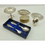 A PEDESTAL SILVER NUT DISH, Birmingham 1931, a cased electro plated CHILD'S SPOON AND FORK with