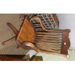 A LATE 19TH CENTURY AMERICAN SLAT BACK OFFICE ARMCHAIR, with well-figured shield shaped seat, on