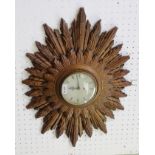A MID 20TH CENTURY SMITH'S HANGING WALL CLOCK with moulded sunburst frame