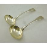 THOMAS WILKES BARKER A PAIR OF GEORGE III "FIDDLE" PATTERN SILVER SAUCE LADLES, London 1809,