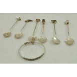 SIX CHINESE SILVER SPOONS with various figurative terminals and a CHINESE SILVER BRACELET