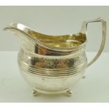 A GEORGE III SILVER CREAM JUG, London 1811, 146g