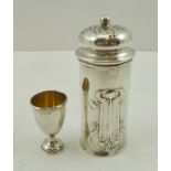 AN ART NOUVEAU SILVER PEPPER Sheffield 1905, 9cm high and a SMALL ETON COLLEGE SILVER CHALLENGE CUP,