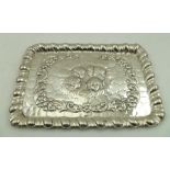 WILLIAM DEVENPORT AN EDWARDIAN SILVER TRAY, having embossed cherub masks within a floral wreath