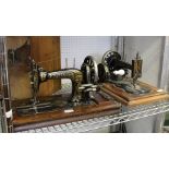 A VINTAGE WOODEN CASED "FRISTER & ROSSMANN" MANUAL SEWING MACHINE, together with another similar (2)