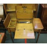 AN EARLY 20TH CENTURY OAK SIDE TABLE METAMORPHING INTO A MULTI-COMPARTMENT DESK, with lift-up fold-