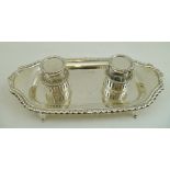 WILLIAM HUTTON & SONS LIMITED A LATE VICTORIAN SILVER STANDISH, the tray base with decorative rim,