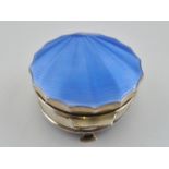 AN ART DECO SILVER AND ENAMEL TRINKET BOX, having hinged cover with blue guilloche enamel scallop