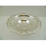 CHARLES WESTWOOD & SONS AN EDWARDIAN SILVER PEDESTAL FRUIT BOWL, of pierced decorative design with