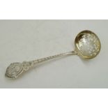 GEORGE UNITE A VICTORIAN SILVER SUGAR CASTING LADLE, having chased decoration, the handle engraved