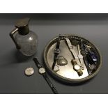 A silver topped cut glass jug, plated tray, Omega pocket watches and various other watches.