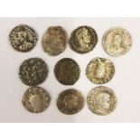 A collection of ten Roman coins.